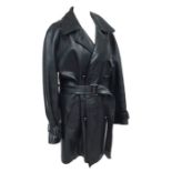 A black leather coat from Katharine Hamnett, double breasted with leather buttons and quilted lining