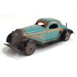 A tinplate clockwork motorcar, Made in England, turquoise with yellow/red trim and black running