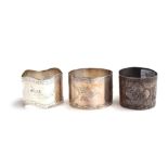 Three silver napkin rings with bright cut decoration, 2oz Provenance: from the estate of Elizabeth