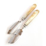 A pair of mother of pearl handled silver stilton scoops, maker's mark TS, Birmingham 1834