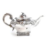 A William IV silver teapot of compressed spherical form, Charles Fox II, London 1836, with a wild