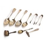 A small collection of silver spoons, including an Irish silver fiddle pattern spoon by Samuel