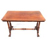 A Regency satinwood writing desk, each end with twin baluster turned column supports raised on