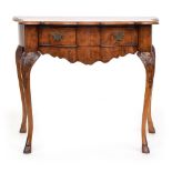 A 19th century Dutch burr elm veneered side table, the shaped front with two frieze drawers above