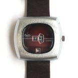 A CHROMED STEEL ZENTRA ANCRE WRIST WATCH CIRCA 1970s, 'JUMP HOUR' with date aperture Movement: