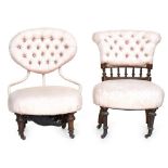 A Victorian upholstered nursing chair with button back, together with another similar with spindle