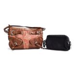 Monogrammed fabric and tan leather handbag from DKNY with buckled pockets and strap detail (23x