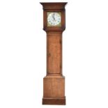 An oak long case clock by George Eveleigh of Beaminster, bras dial with Roman numerals and date