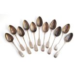 A set of 11 George IV silver fiddle pattern spoons, crested, by William Eley & William Fearn, London