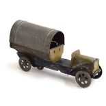 A very early tinplate clockwork hooped van