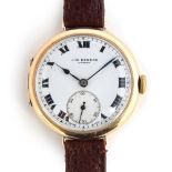 A GENTLEMAN'S 9CT GOLD BENSON TRENCH WATCH CIRCA 1930s, WHITE ENAMELLED DIAL