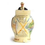 A Fielding's Crown Devon, "The Eton Boating Song", moulded pottery jug, with figural handle, the