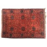 A small red ground West Persian rug, 130x193cm