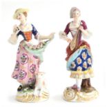 An early 19th century Crown Derby figure of a Dresden Shepherdess with a lamb at her feet and her
