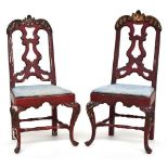 A pair of Venetian late 18th century scarlet lacquer and rocaille carved parcel gilt side chairs,