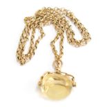 A 9ct gold chain, approximately 12g, with large pale yellow stone