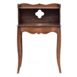 A continental mahogany bedside table, shaped three quarter galleried top above undershelf and shaped