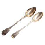 Two George III silver crested fiddle and thread pattern serving spoons, by William Eley, William