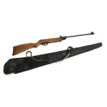 A Spanish El Gamo .22 calibre air rifle with wooden stock, in canvas slip