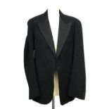 A gent's single breasted dinner jacket with corded silk facings by Curtis & Sons, Blandford,