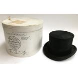 A Lock & Co. black top hat with box, size 1/2