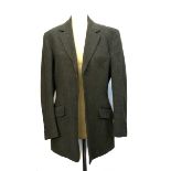 A gent's tweed suit, in herringbone tweed, made by Ward & Kruger, Sackville Street London W1,