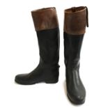 A pair of Le Chameau black rubber hunting boots with mahogany leather tops, size 42 (8.5)