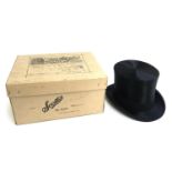 Herbert Johnson gent's black silk top hat in Scotts The Hatters, 1 Old Bond Street, London W1