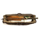 A vintage leather cricket bag containing a pair of pads, gloves, and cricket bat, The Jim Parks