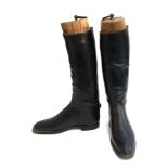 A pair of gent's hunting boots with fitted wooden trees, approximately size 9, narrow fit