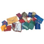 A large quantity of gents silk squares in a leather wallet