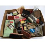 A mixed box of gents accessories to include hair and shoe polish accessories, buttons, Blakey's