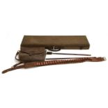 A leather cartridge bag, cartridge belt, and a canvas and leather gun case, felt lined, made by K.D.