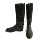 A pair of well patched gent's black leather hunting boots, approximately size 8.5