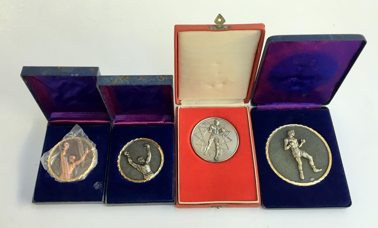 Four new boxing medals in presentation boxes