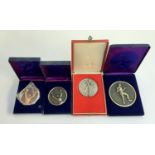 Four new boxing medals in presentation boxes