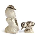 A ceramic sculpture of a great crested grebe chick, together with a tree creeper, 9cmH