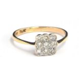 An 18ct ring set with nine mine cut diamonds, size P, gross weight 1.8g