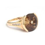 A smokey quartz and diamond 9ct gold ring, size N, gross weight 5.1g