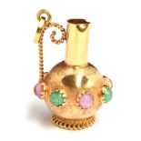 An 18ct gold pitcher charm, approx. 2cm wide and 3.5cm high, decorated with pink and green stones,