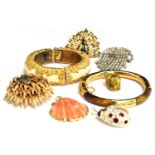 A lot of costume jewellery in a wooden box to include a bracelet marked KJL (Kenneth Lane),