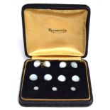 A cased set of moonstone dress studs, comprising two cufflinks, four buttons and three studs;