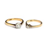 An 18ct gold solitaire diamond ring (approx. 0.5ct, small occlusion visible), size O, gross weight