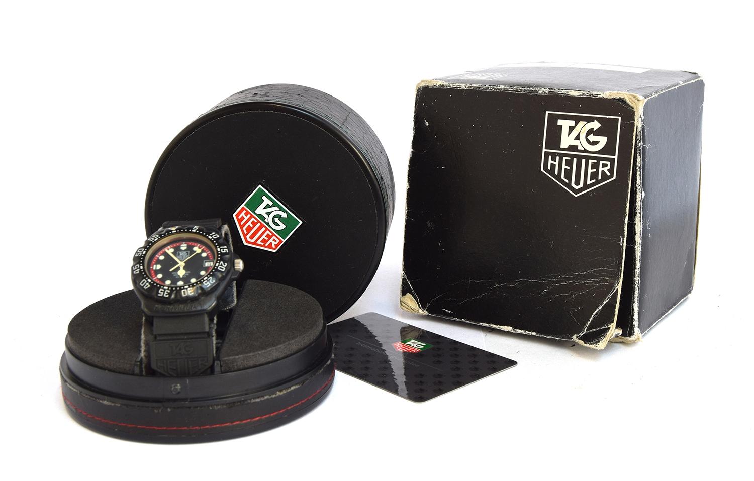 A TAG HEUER FORMULA 1 GENTLEMAN'S QUARTZ WATCH black dial with red outer ring, luminous dot hour - Image 2 of 2