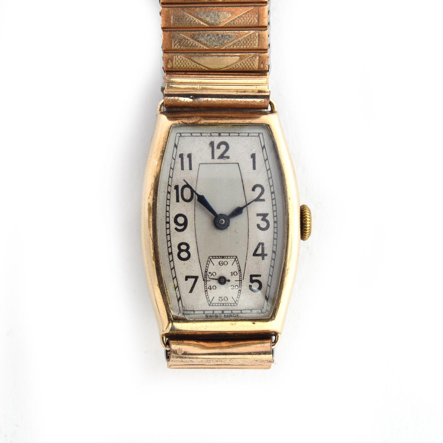 A 9CT TONNEAU SHAPED 1930S GENTLEMAN'S WATCH Engraved to the back, two tone dial with black Arabic