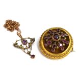 An Art Nouveau amethyst and seed pearl pendant on a 9ct gold chain; together with a yellow metal