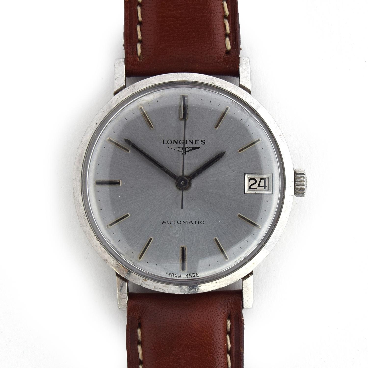 A LONGINES GENTLEMAN'S STEEL AUTOMATIC WRIST WATCH Circa 1960s, silvered dial with raised silver