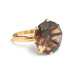 A 9ct gold smokey quartz ring, size N, gross weight 5.9g