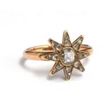 A 9ct gold mine cut diamond ring in the form of a star, size O, gross weight 3.2g