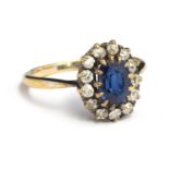 A sapphire and diamond gold ring (hallmark rubbed), approx. weight 2.9g, size N